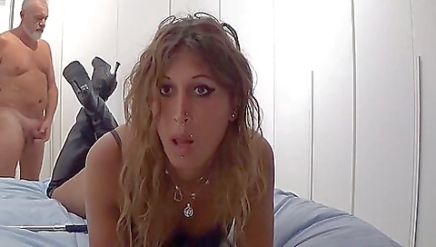 Blonde girl with leather boots is getting fucked by a guy