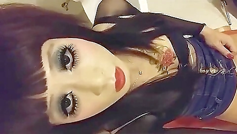 Tattooed brunette in lingerie gets dildo in her pussy