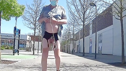 Travesti riding a toy on outdoor and in her stockings