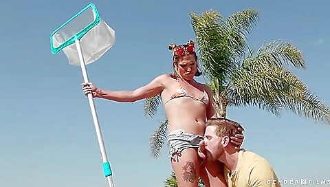 Busty blonde with a tattooed ass is showing off her body